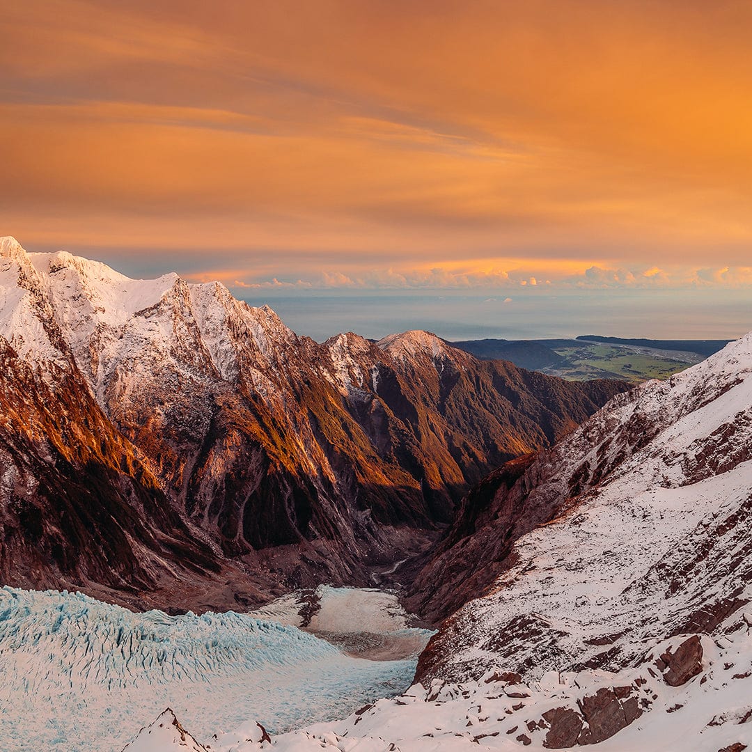 First Light in Franz - Franz Josef Glacier Photographic Print by Mike Mackinven