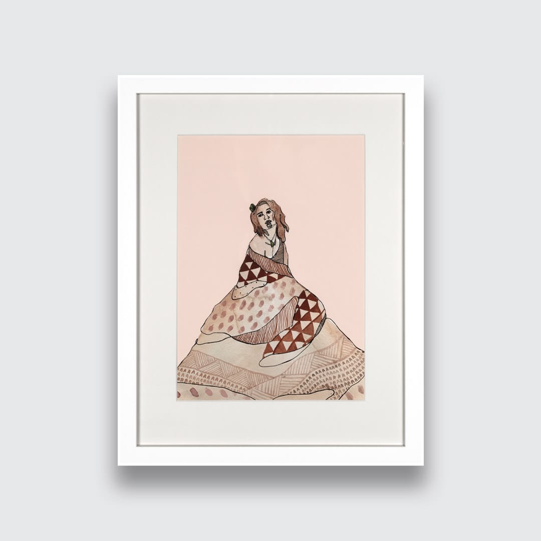 A framed art print featuring a stylized illustration of a woman in a patterned dress on a pale pink background, presented in a white frame against a light gray wall.