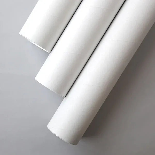 Three packing tubes on a gray background