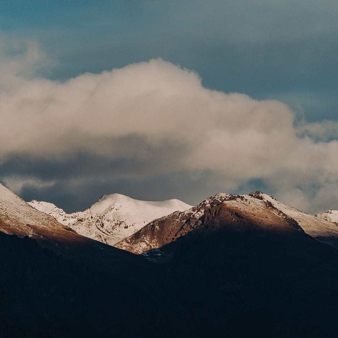 White Peaks Under Blue Skies Art Print by Jessica Higueras